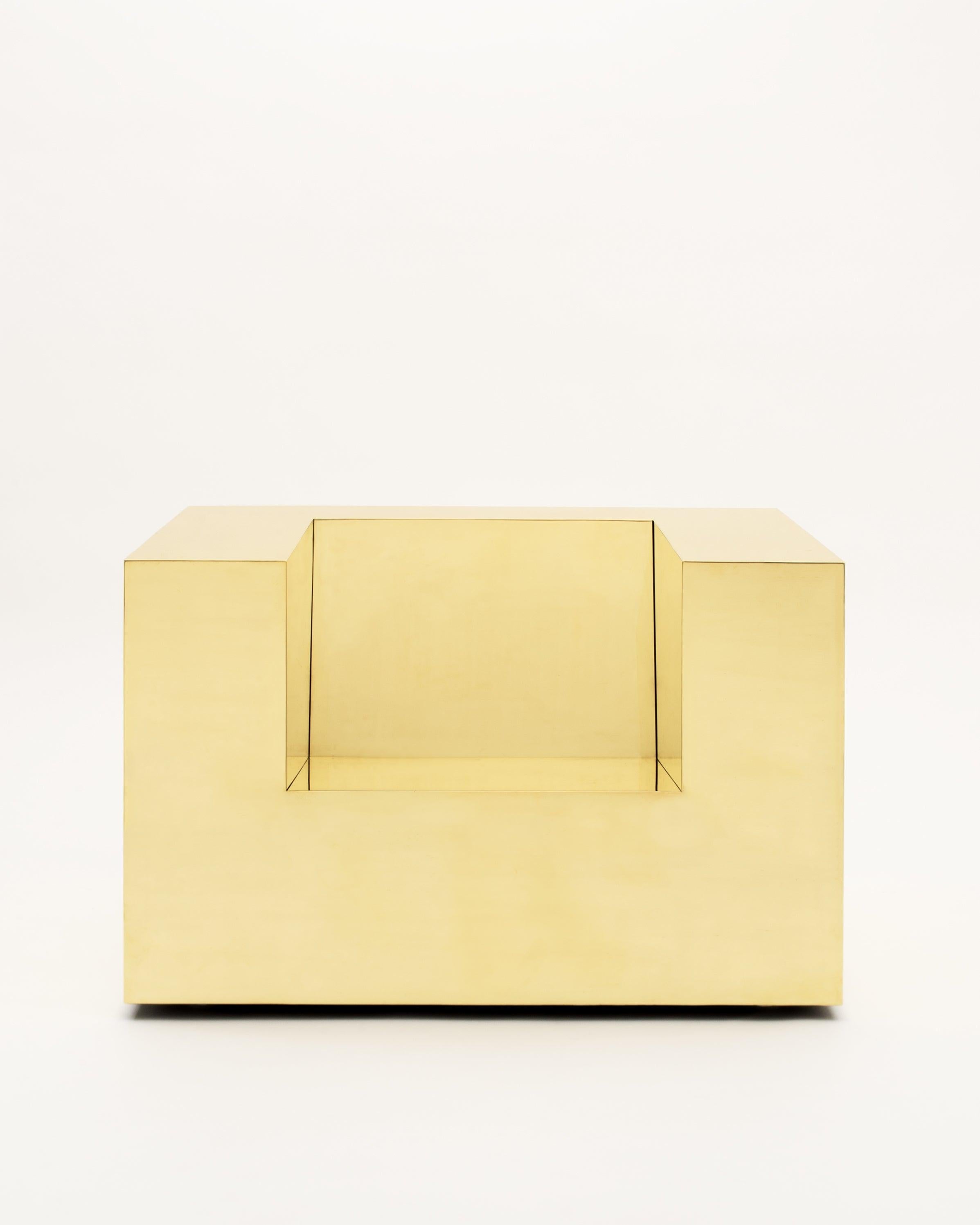 Subtracted Cube is a study in blending minimalism with extravagant luxury. The name derives from one of the essential digital modeling elements, using one primitive form to remove from another to create a third. Executed in brass, the result is a