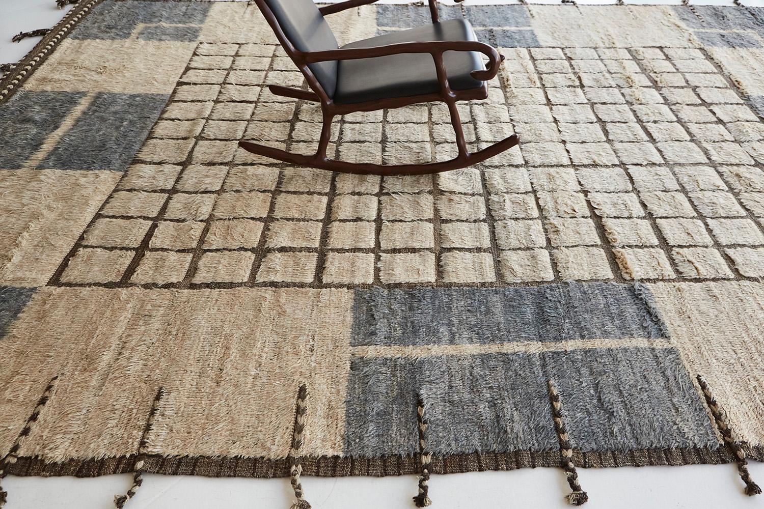 This outstanding mastery of Sudersand rug from the Kust Collection features perfect detailed patterns of charcoal, cream, and chocolate brown outline and fringes. A collection that will light up your space and bring life. Highly recommended for your