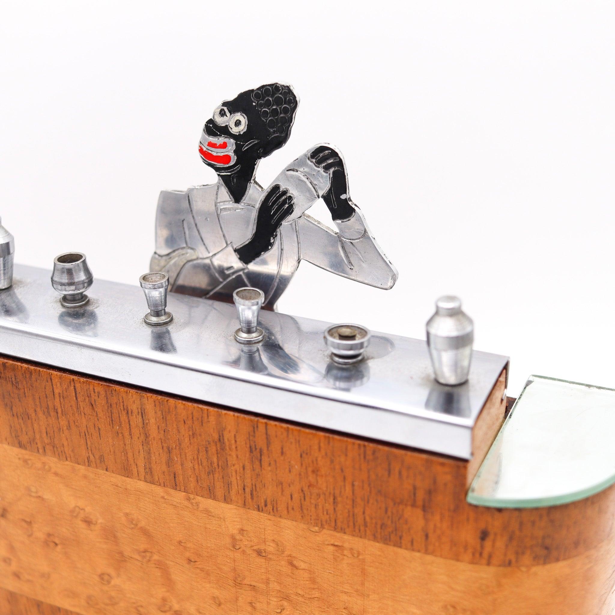 Barman mechanical cigarette dispenser bar designed by Raymond Sudre.

Fabulous and very elusive piece, created in France by Raymond Sudre during the art deco period, back in the 1930. This is a striking early 30's cigarette dispenser in the shape of