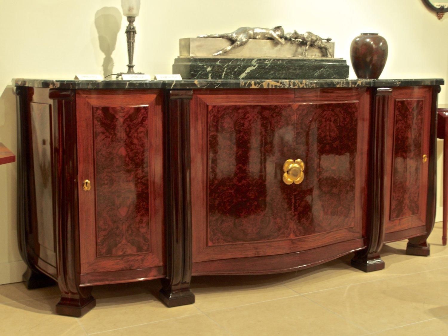 Classic French Art Deco cabinet/buffet/server by Sue et Mare, circa 1925, in black rosewood  and burled walnut with gilt bronze fittings and original Porteur marble top. 81