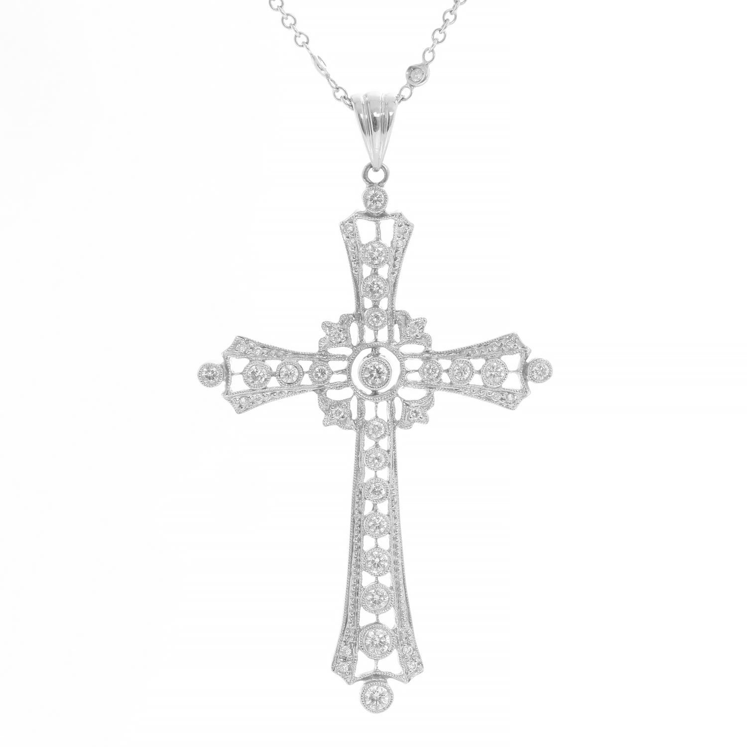 18K White Gold cross approx. 1.2 ct. VS-SI, HI color. on a 10 inch diamonds by the yard chain. Total diamond chain 1 ct.

Sue Gragg is a jewelry designer based in Dallas, Texas, known for her unique and high-end jewelry designs. Her jewelry is often