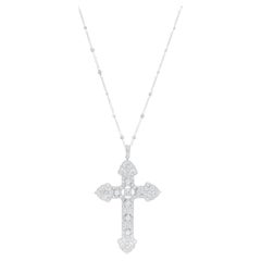 Sue Gragg, collier croix en diamants et diamants au mètre