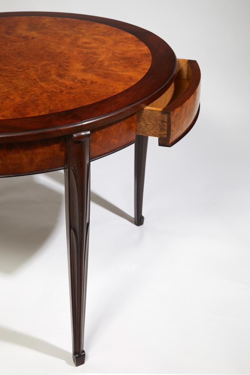 In wood and Thuya circular side table opening with two drawers in a belt, resting on four sculpted legs with stylized foliage and sticks motifs.


Origin:

Collection Edouard Mignot, Marne, France; Collection particulière en Auvergne,