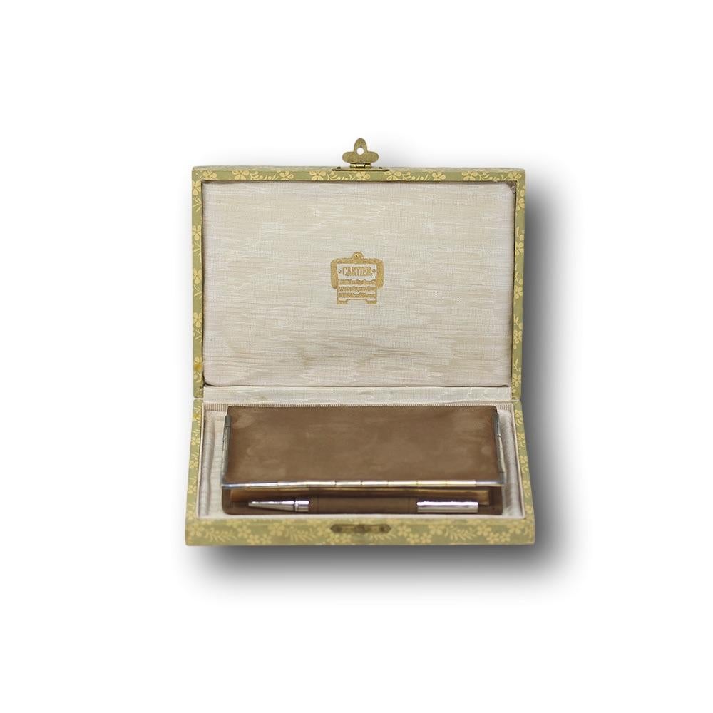 Cartier suede notebook with silver mounts circa 1920. The notebook of petit from silver mounted with a brown suede base delicately made complete Cartier logo to the inside bottom left. The interior fitted with pockets to the left and right and a