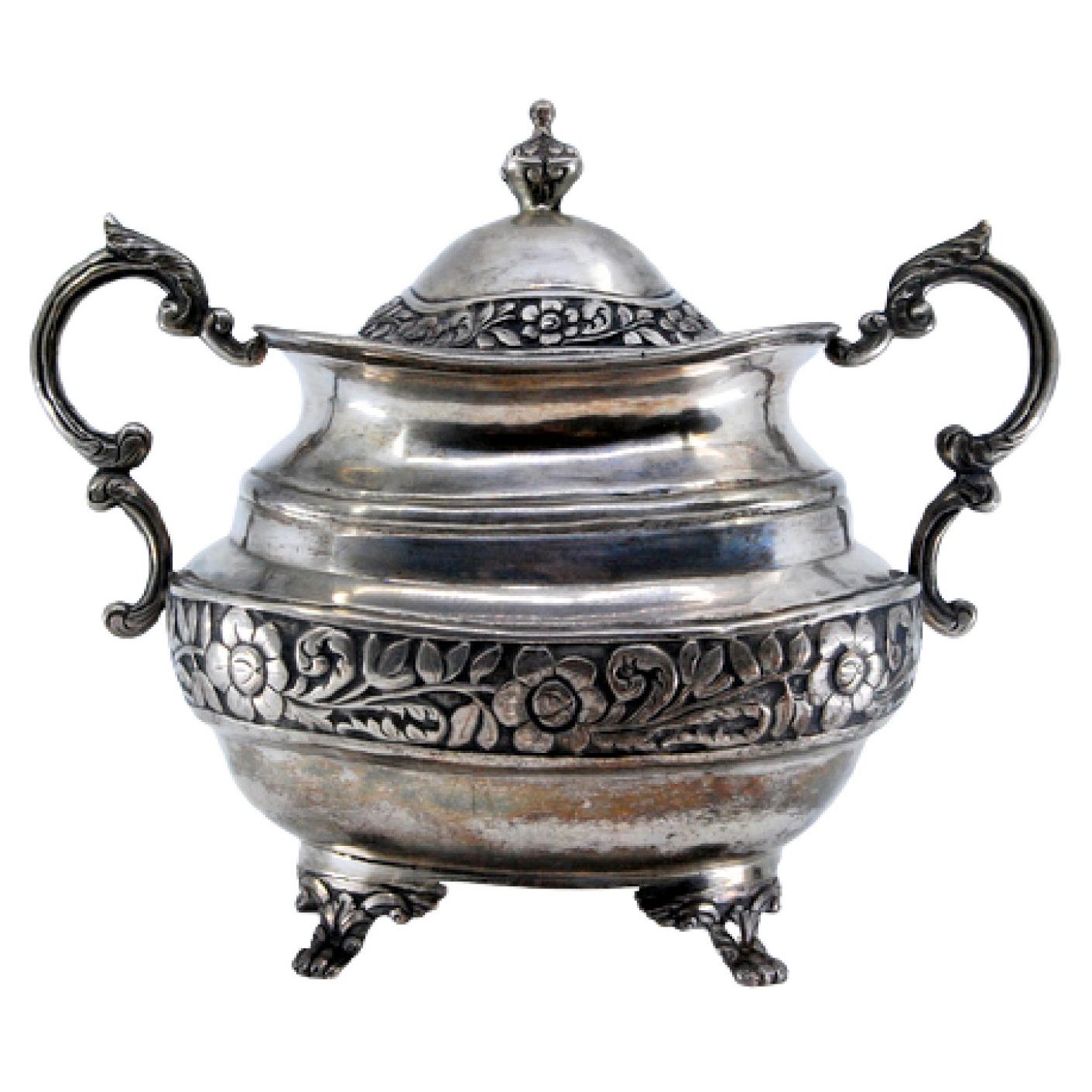 Sugar bowl in silver with a revealed surround and lid, resting on four claw feet