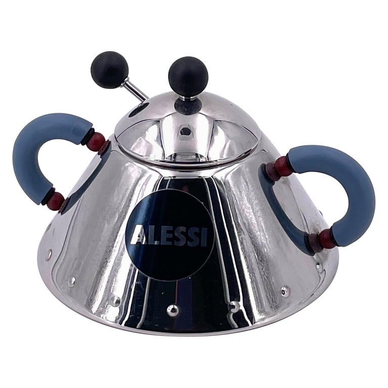 https://a.1stdibscdn.com/sugar-bowl-spoon-designed-by-michael-graves-for-alessi-memphis-era-for-sale/1121189/f_235529021619727036845/23552902_master.jpg?width=768