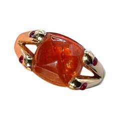 sugar-loaf cut Spessartine garnet and ruby ring