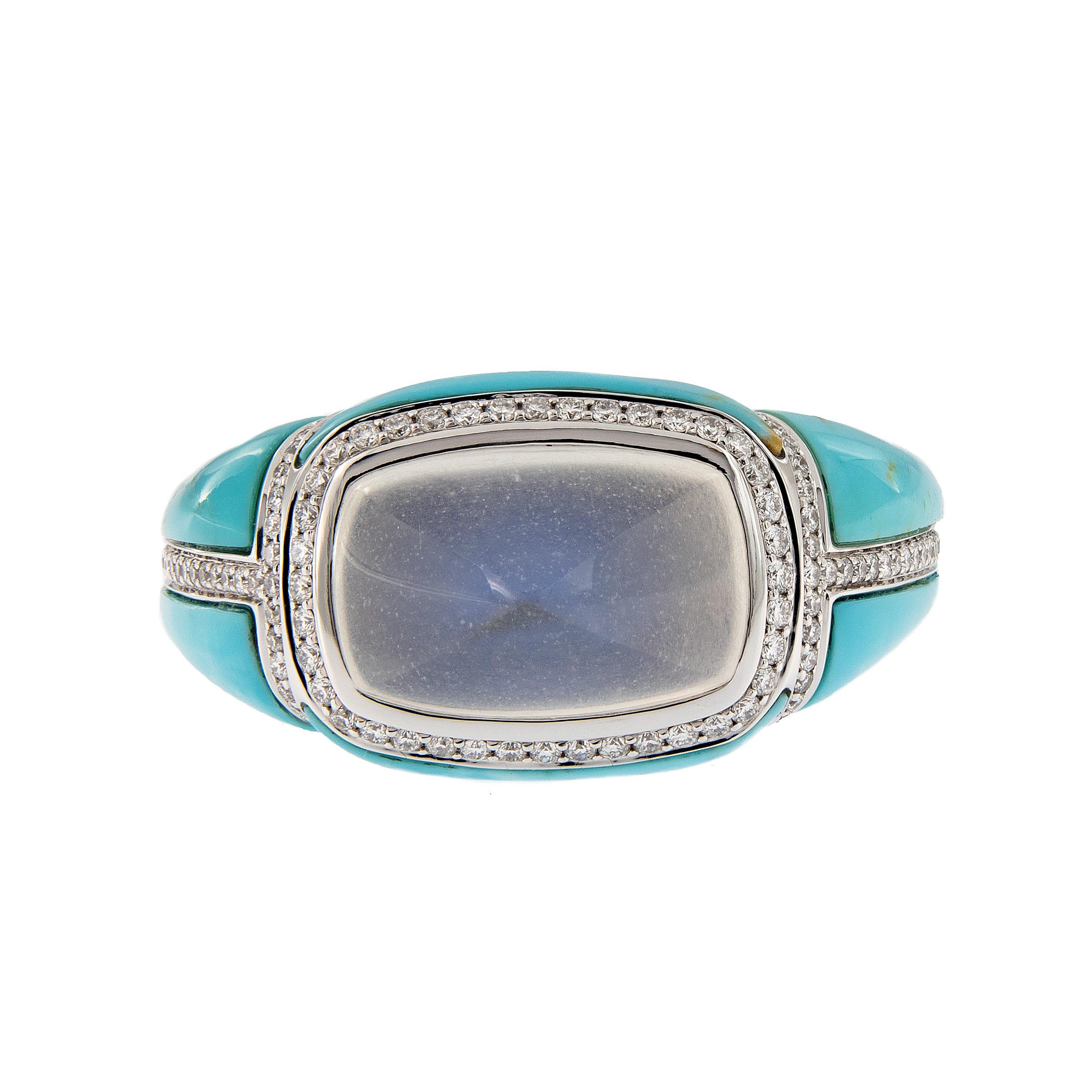 This beautifully crafted unique dome ring is a stunner! Ring centers around a sugarloaf blue moonstone and over 9ct of fine 