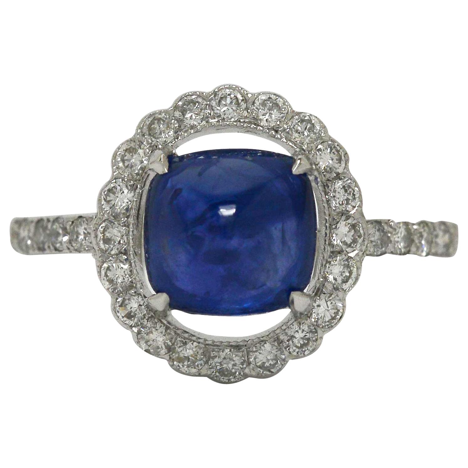 Sugarloaf Cabochon Blue Sapphire Halo Diamond White Gold Target Engagement Ring