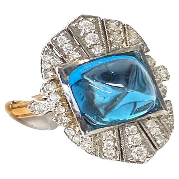 Ring aus Roségold mit Zuckerhut-Cabochon und Diamantschilfrohr