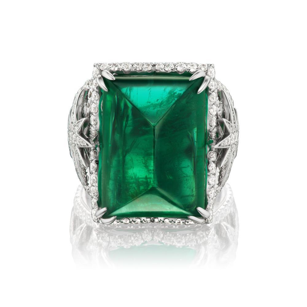 SUGARLOAF
EMERALD AND DIAMOND RING
Takat's new collection displays this elegant Sugarloaf Cabochon cut
emerald with a classy star design for only the finest diamonds
Item: # 04093
Metal: 18k White Gold
Color Weight: 23.36 ct.
Diamond Weight: 1.82 ct.