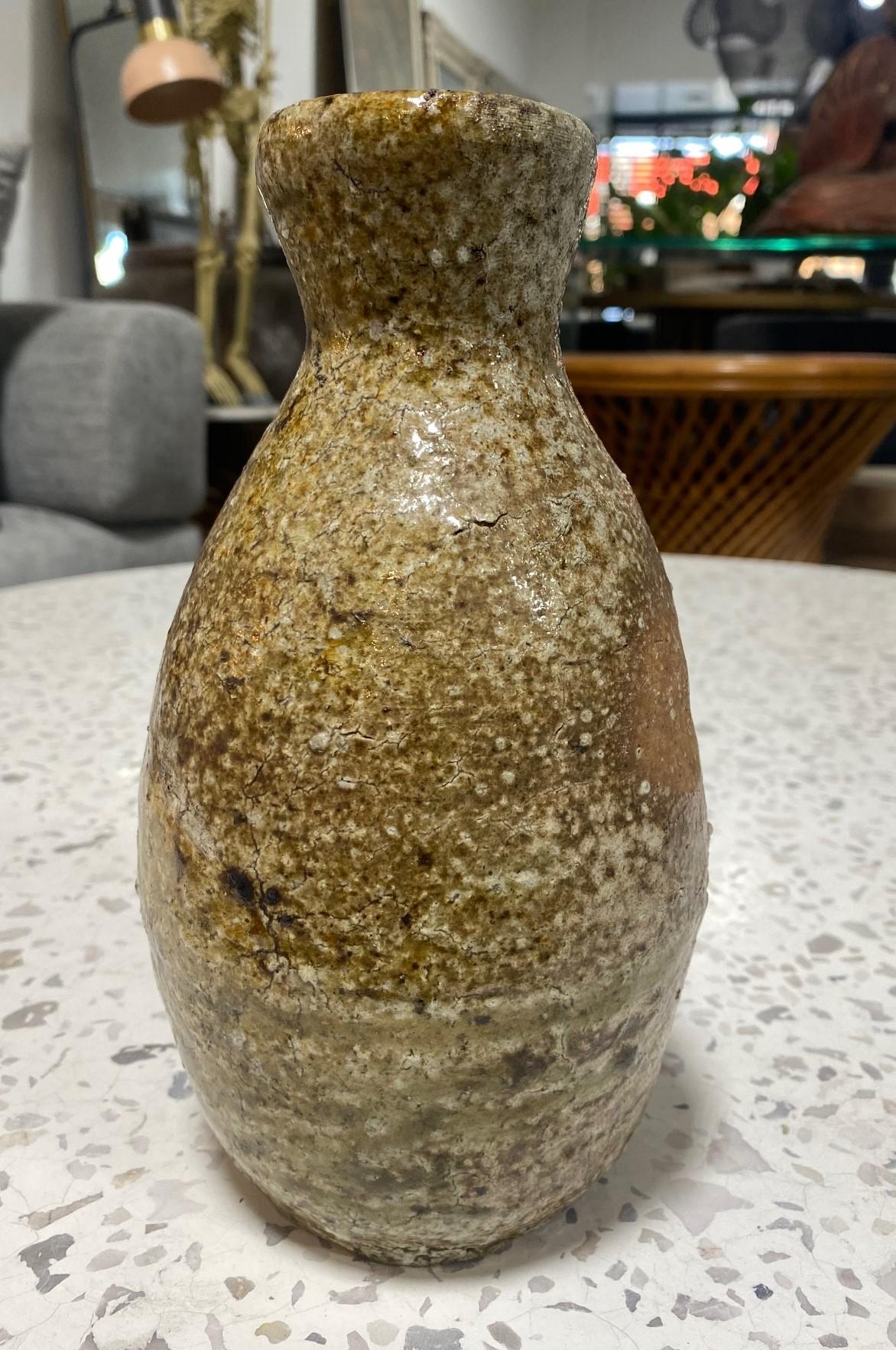 A quite wonderful Shigaraki pottery vase by renowned Japanese potter/ceramicist and Zen master Sugimoto Sadamitsu (1935-). Born in Tōkyō in 1935, Sugimoto is a self-taught, highly admired master of Iga and Shigaraki pottery and has received many