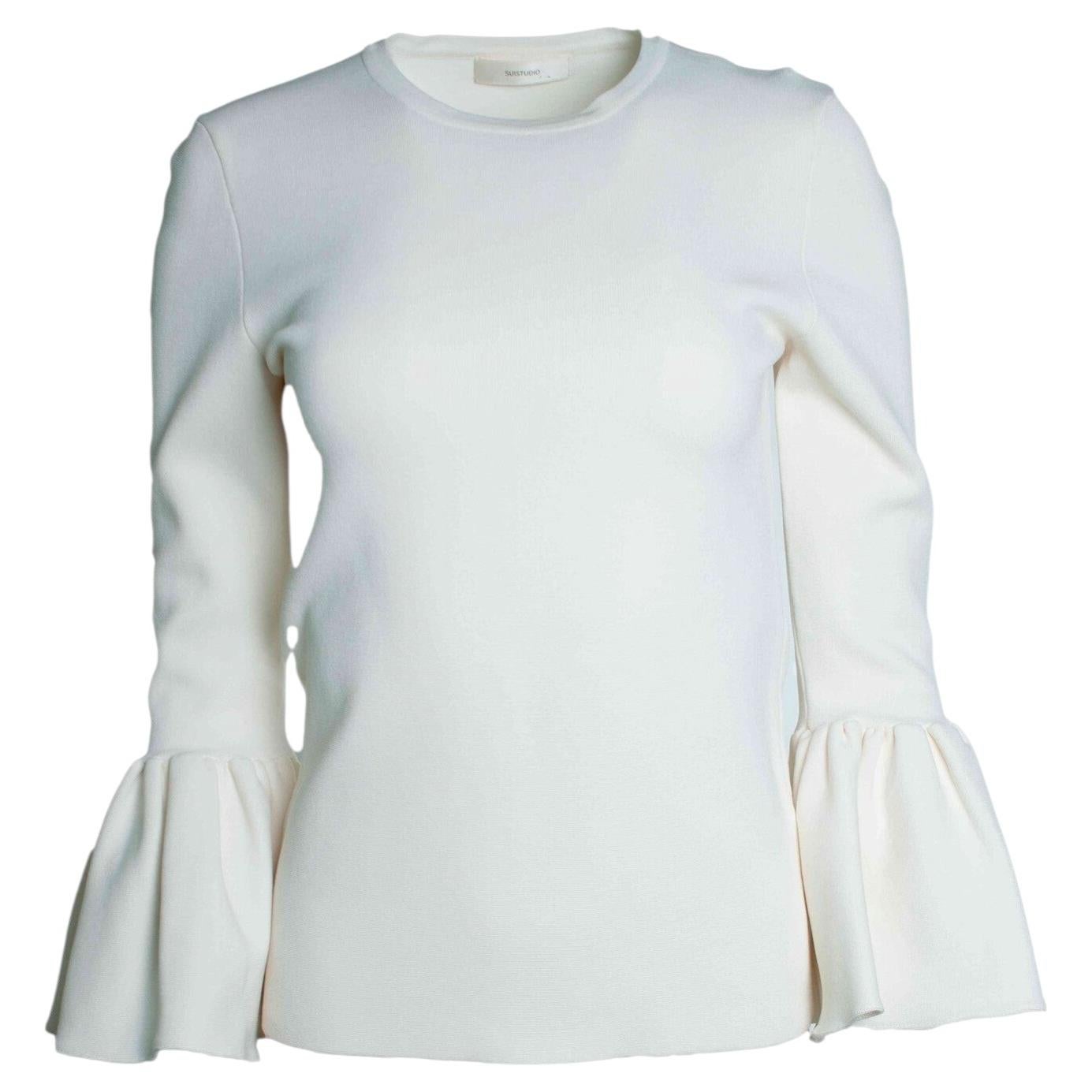 Suistudio, top blanco con mangas de campana Cooper en venta