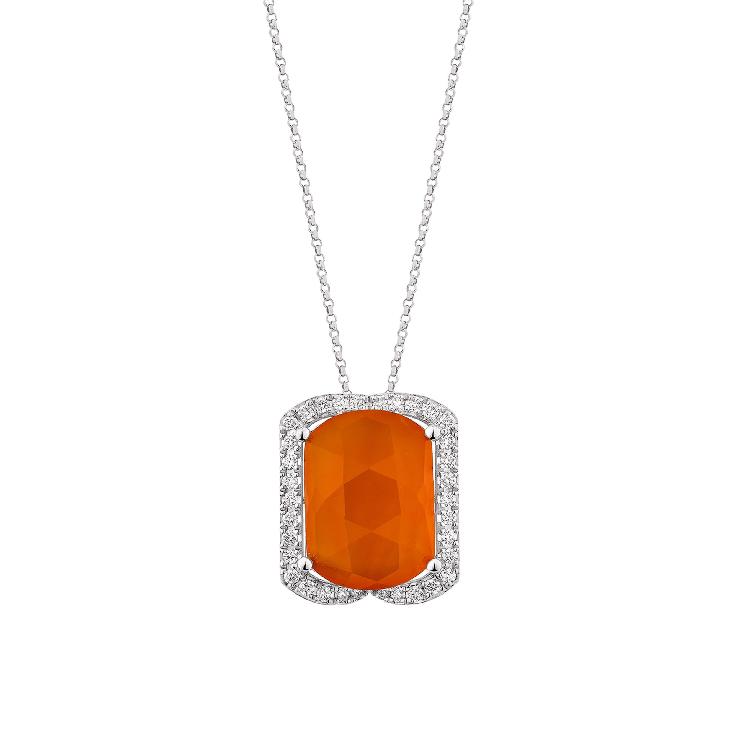This elegant pendant features a vibrant oval carnelian accented with baguette-cut carnelians, set in 14K white gold and finished with a touch of white diamonds for subtle sparkle.

Carnelian Pendant in 14Karat White Gold with White