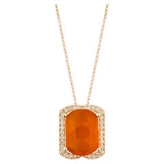 Corniola Suita Nahata 5.98ct. Ciondolo in 14KRG con diamante bianco.