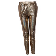 Suite 22, crackled gold leather trousers