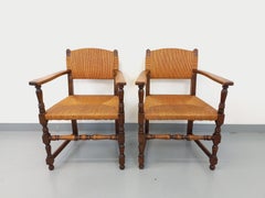 Suite de 2 fauteuils brutalistes Charles Dudouyt vintage en bois et paille