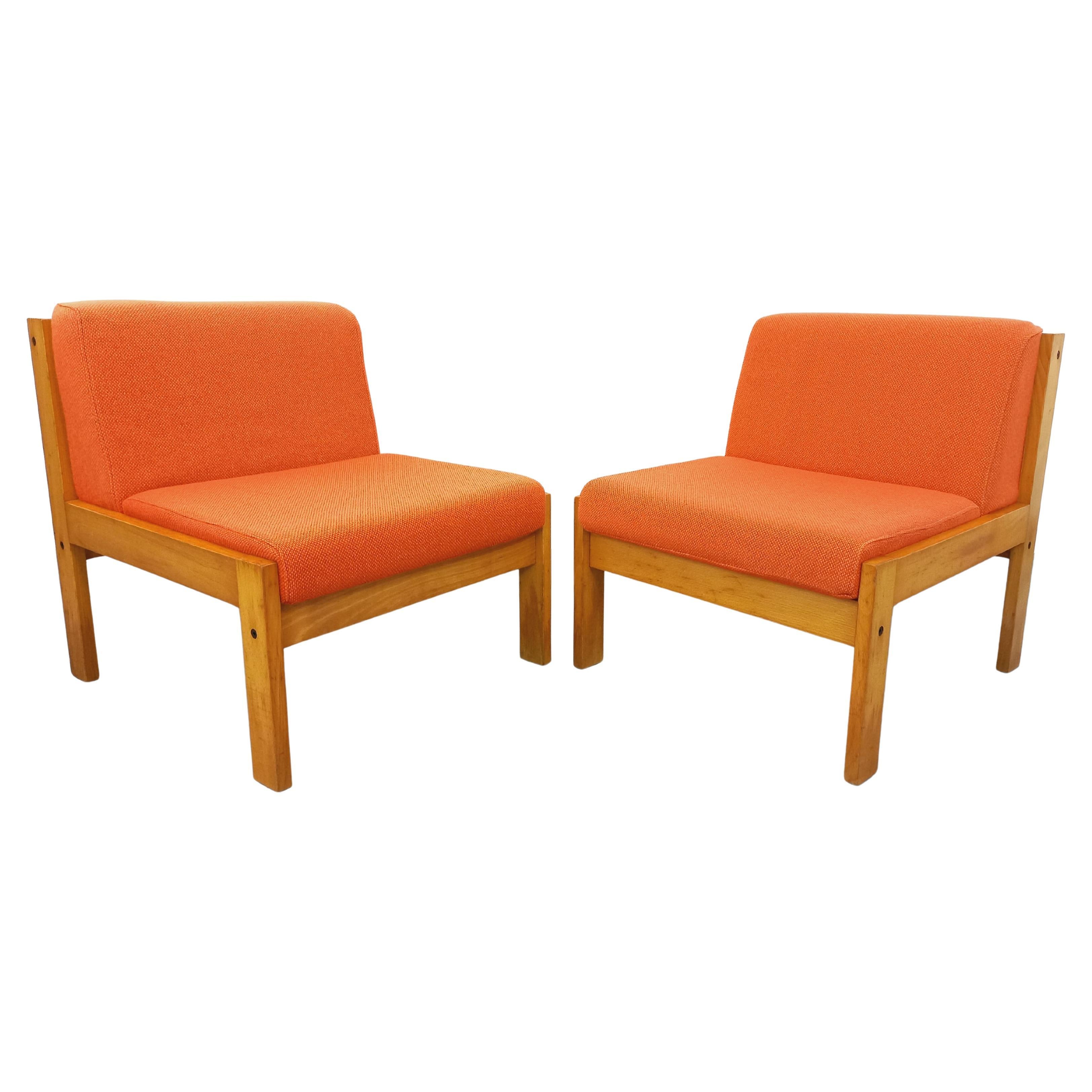 Suite de 2 fauteuils chauffeuses Baumann vintage en tissu orange et bois