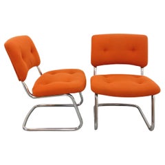 Suite de 2 fauteuils chauffeuses vintage Steelcase Strafor en tissu orange