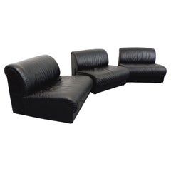 Suite de 3 fauteuils chauffeuses italiennes Delta vintage en cuir noir années 70