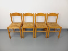Suite de 4 chaises brutalistes vintage en bois clair et paille des années 70 80