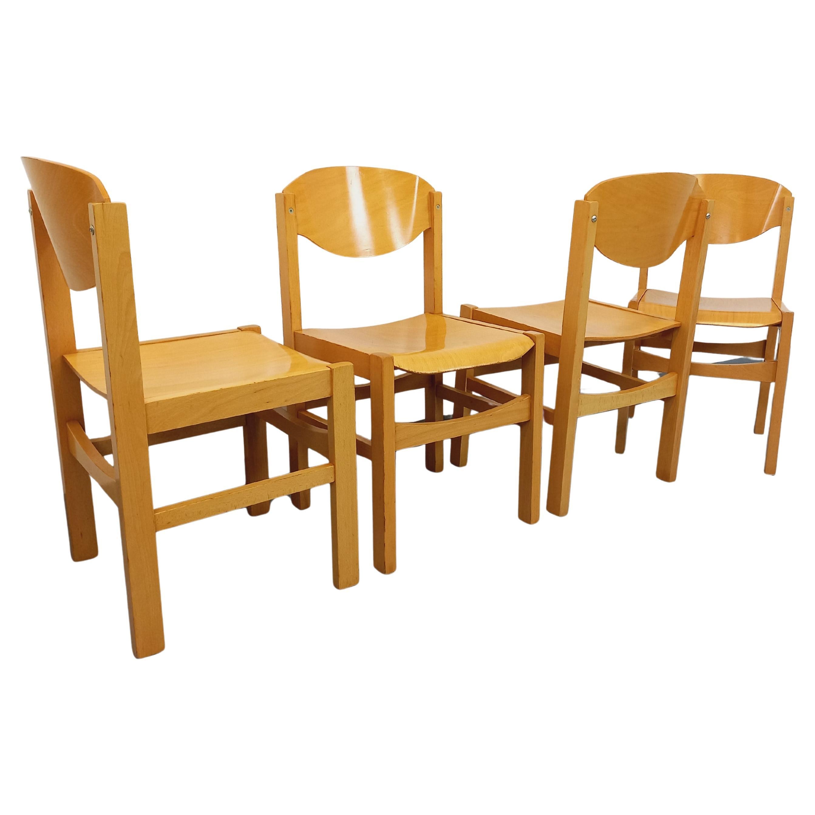 Suite di 4 chaises minimaliste vintage in bois de hêtre degli anni '80