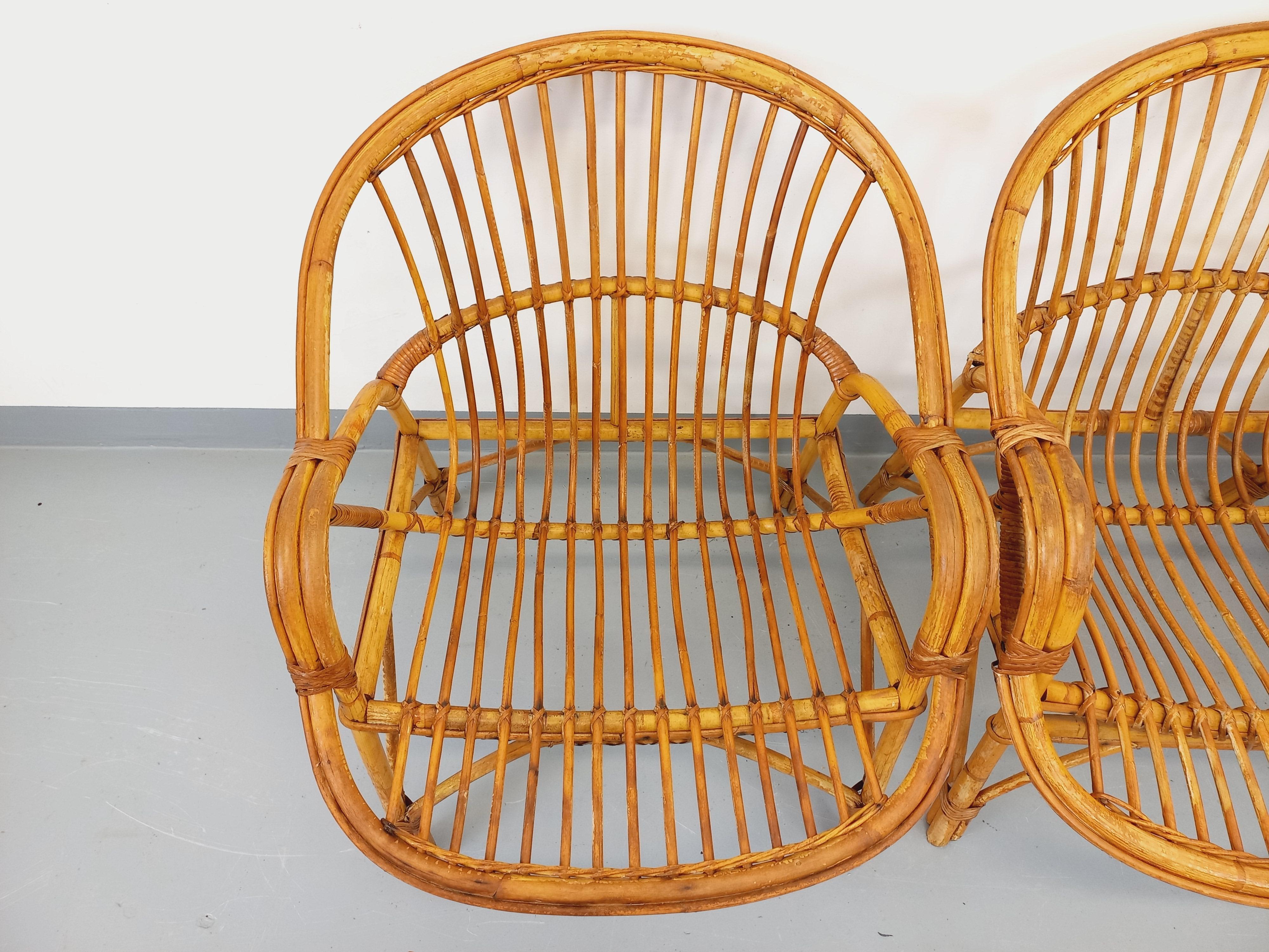 Suite de 4 fauteuils vintage en rotin des années 60 en venta 6