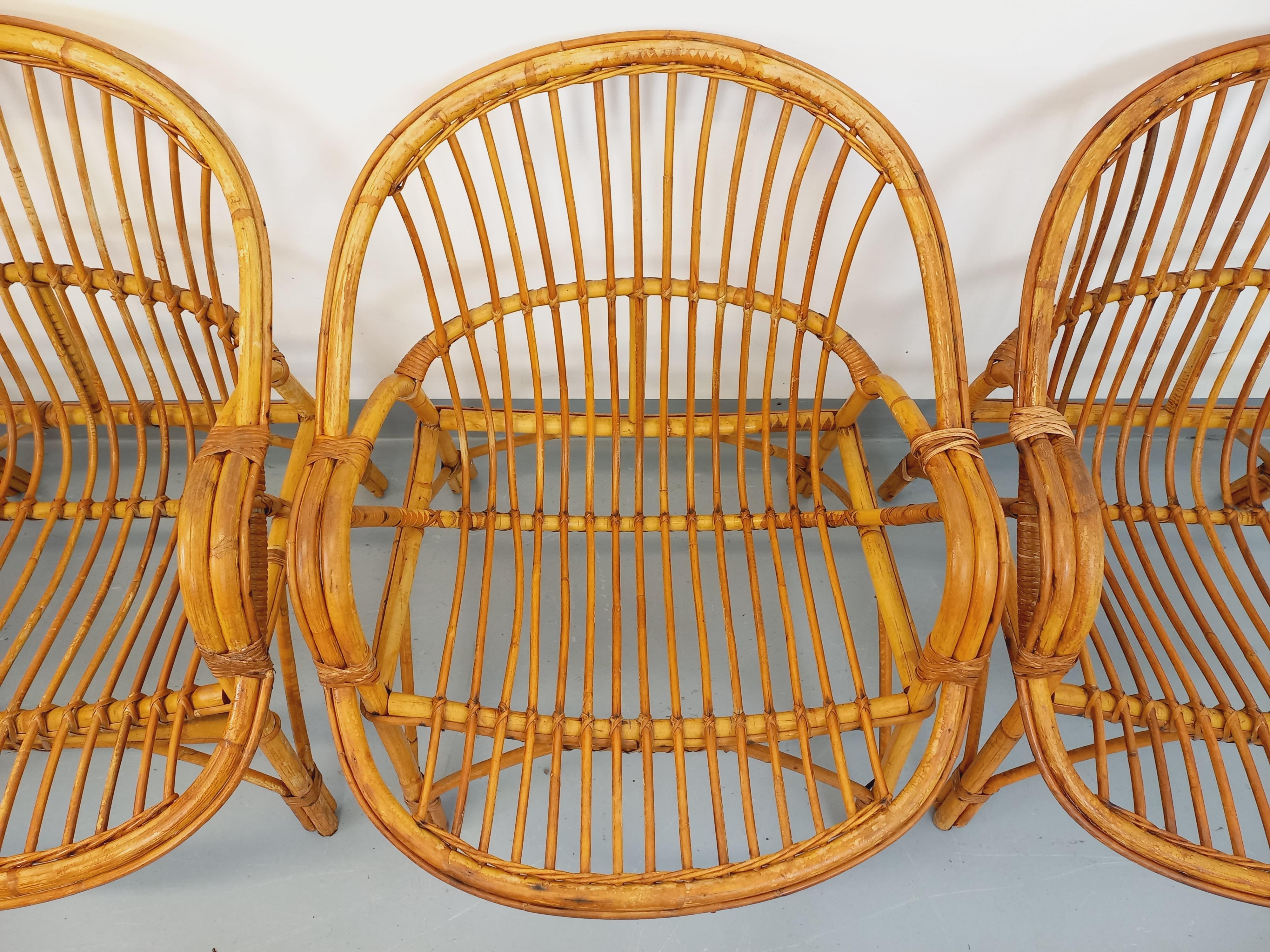 Suite de 4 fauteuils vintage en rotin des années 60 en venta 8
