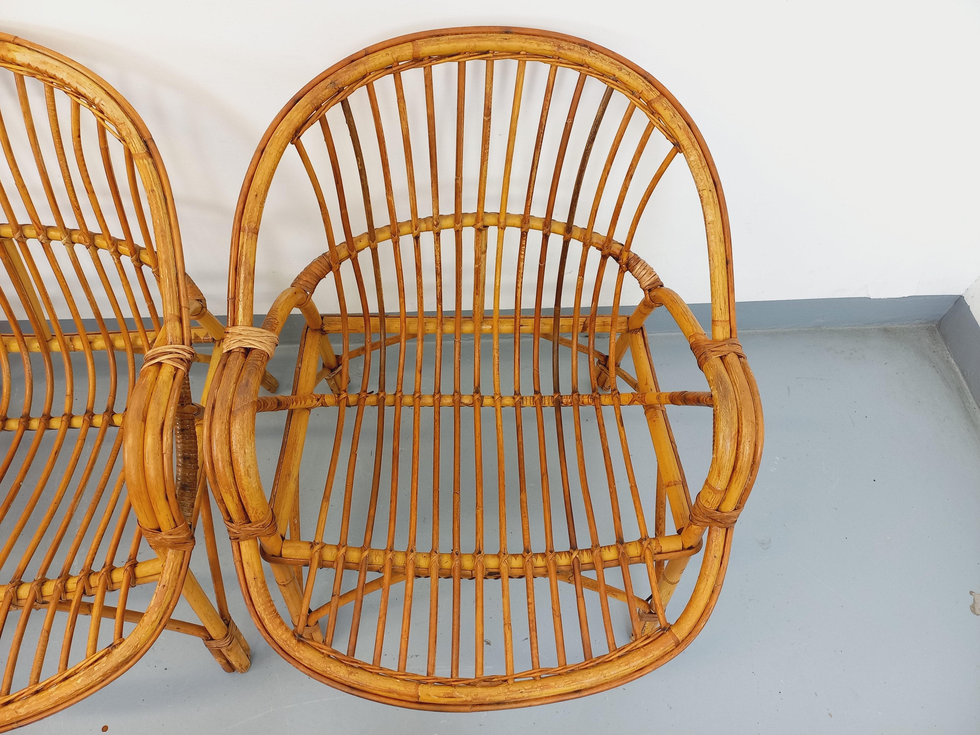 Suite de 4 fauteuils vintage en rotin des années 60 en venta 9