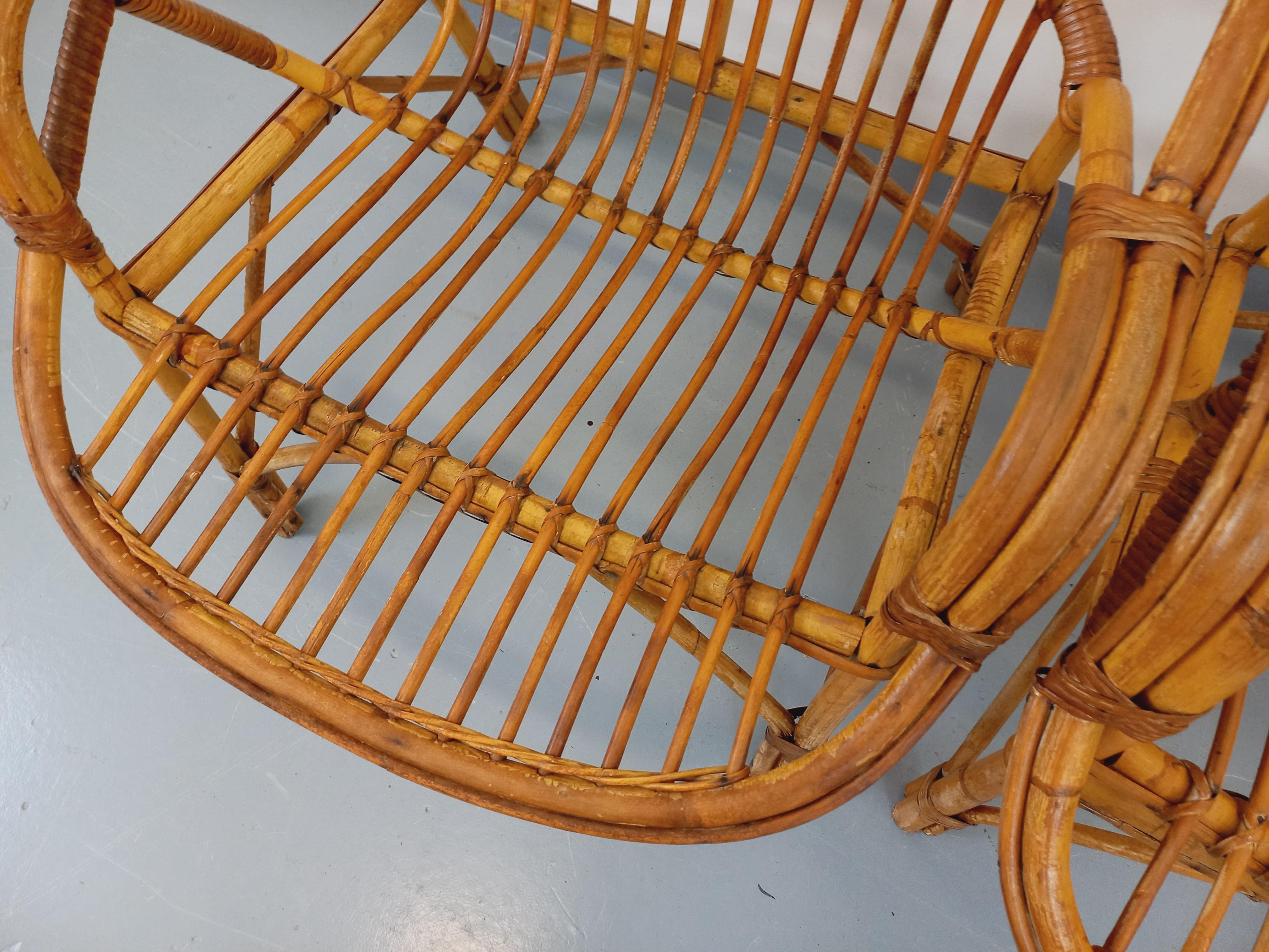 Suite de 4 fauteuils vintage en rotin des années 60 en venta 11