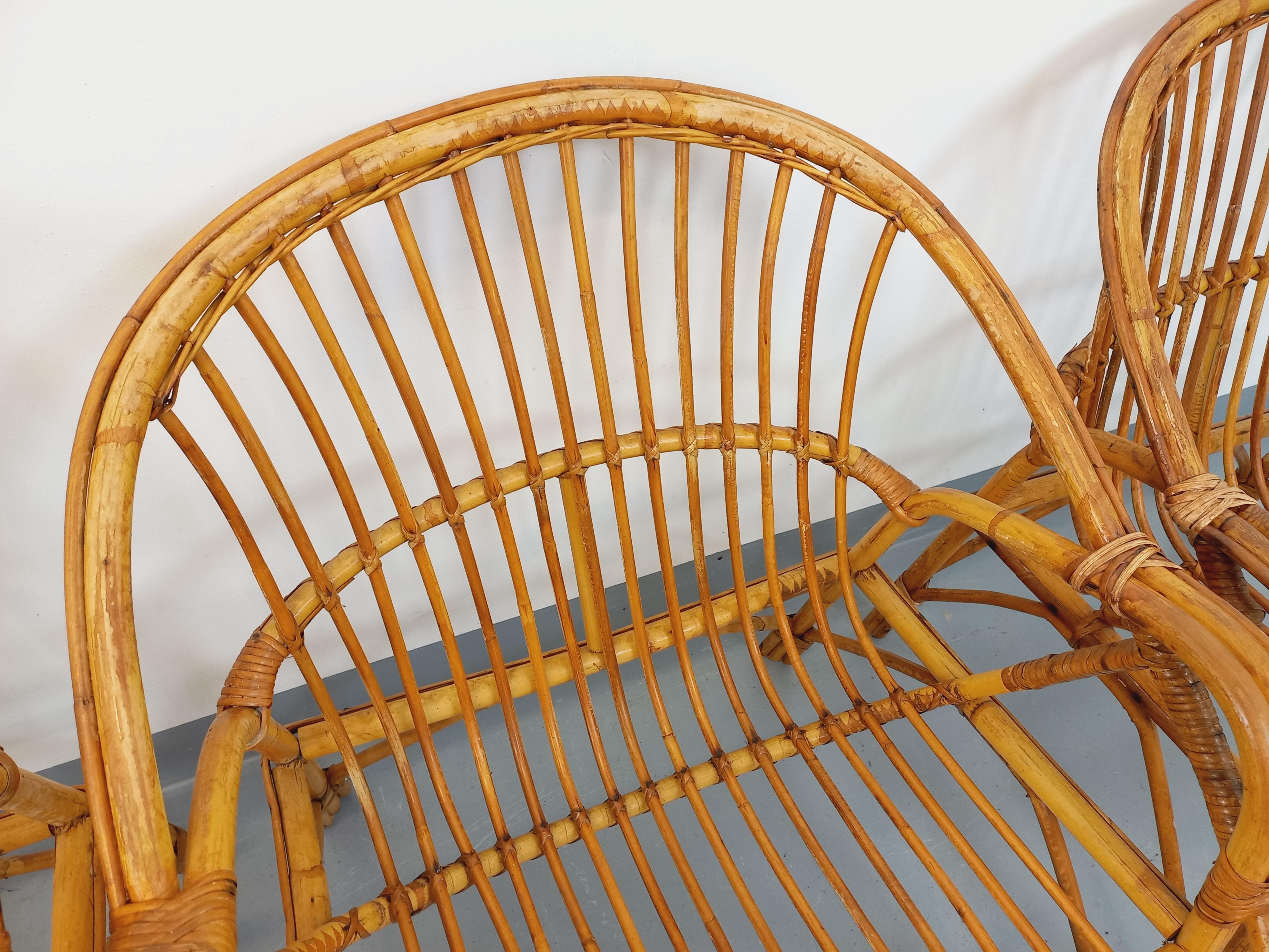 Suite de 4 fauteuils vintage en rotin des années 60 en venta 12