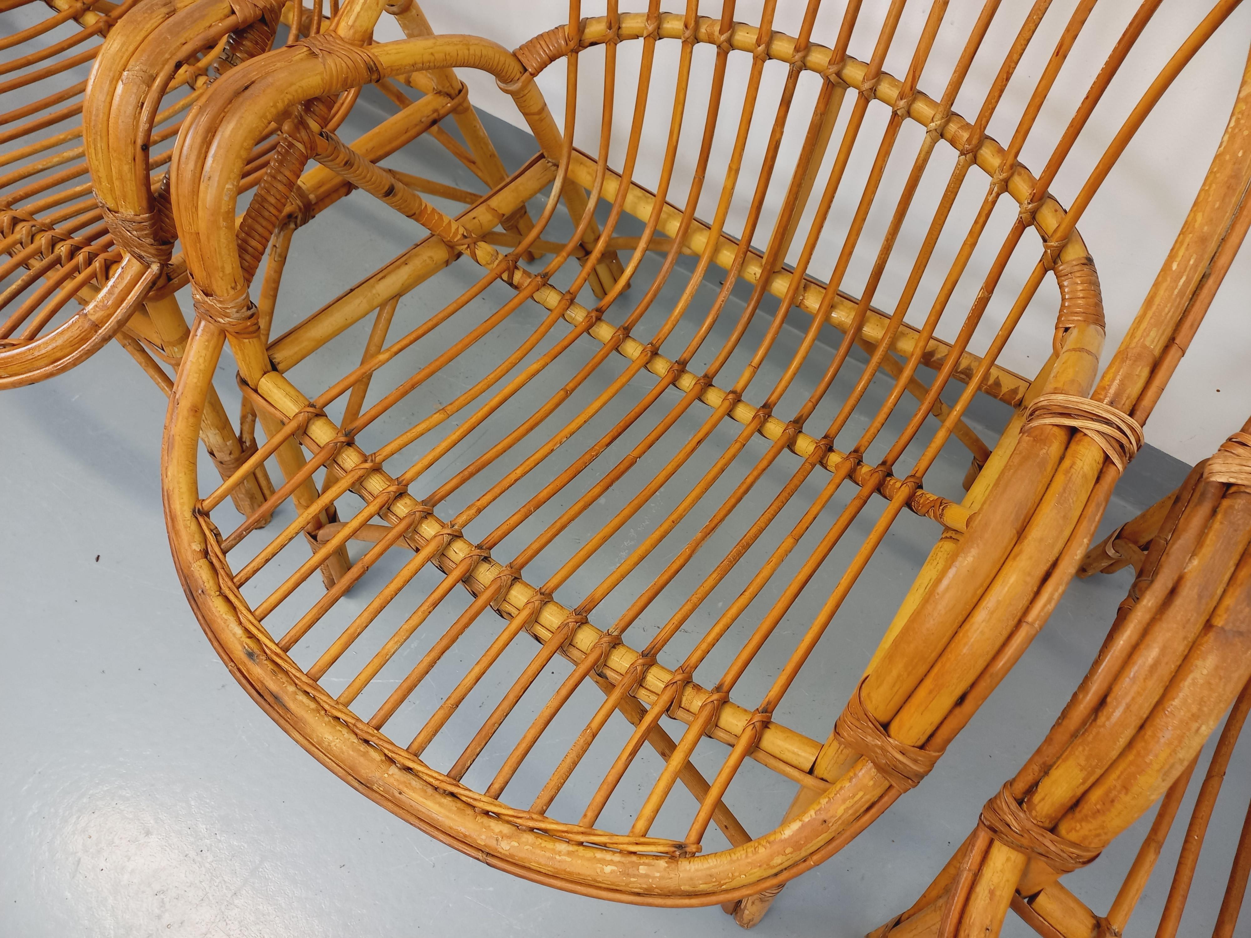 Suite de 4 fauteuils vintage en rotin des années 60 en venta 13