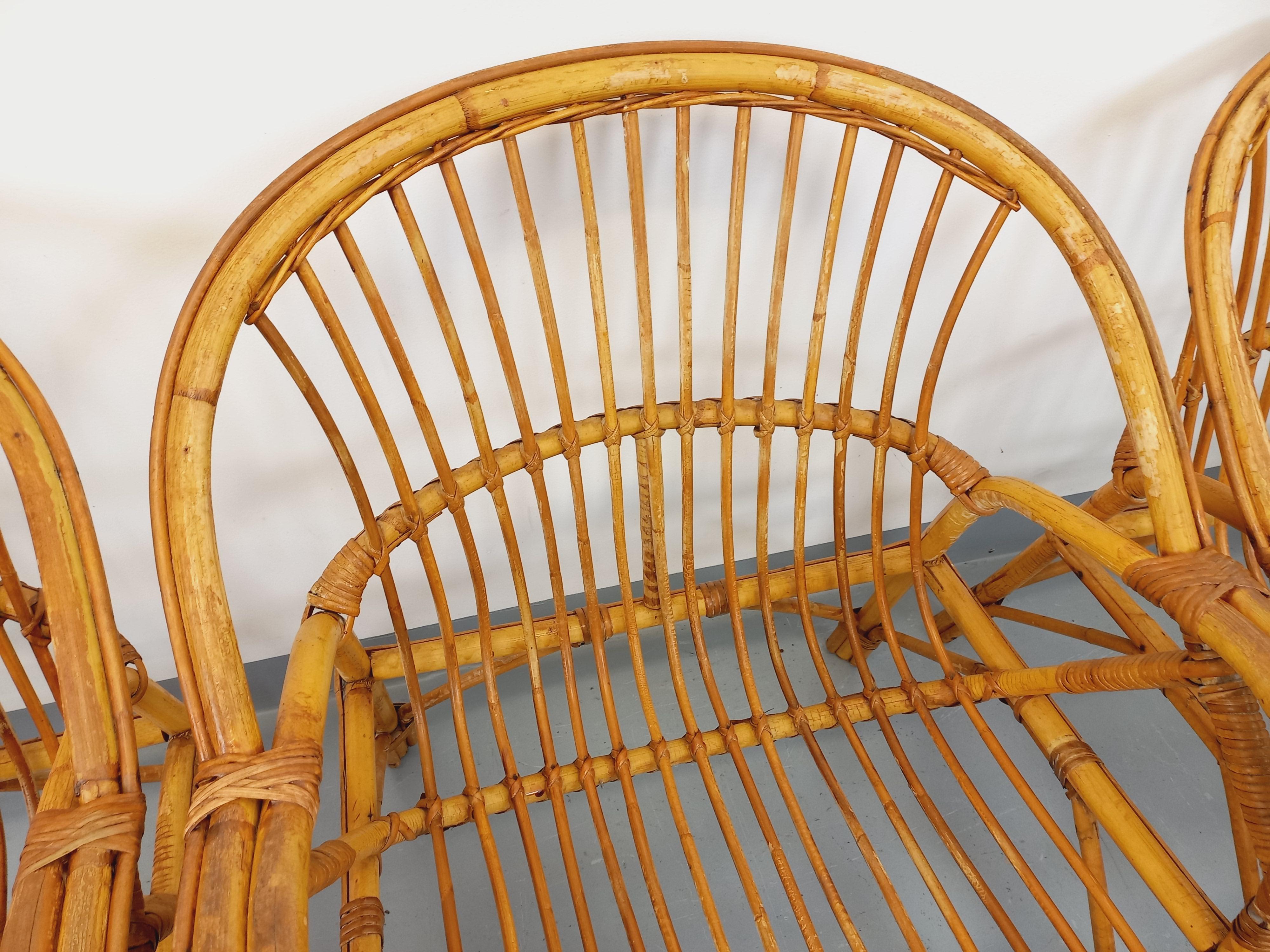 Suite de 4 fauteuils vintage en rotin des années 60 Francés en venta
