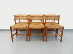 Suite de 6 chaises brutalistes vintage Dordogne de Charlotte Perriand en bois
