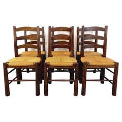 Suite de 6 chaises brutalistes vintage Georges The en bois et paille