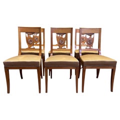 Suite de 6 chaises Empire – Bois fruitier – Dossier lyre sculpté – Début XIXe