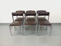 Suite de 6 chaises vintage des années 70 en métal chromé et skai marron