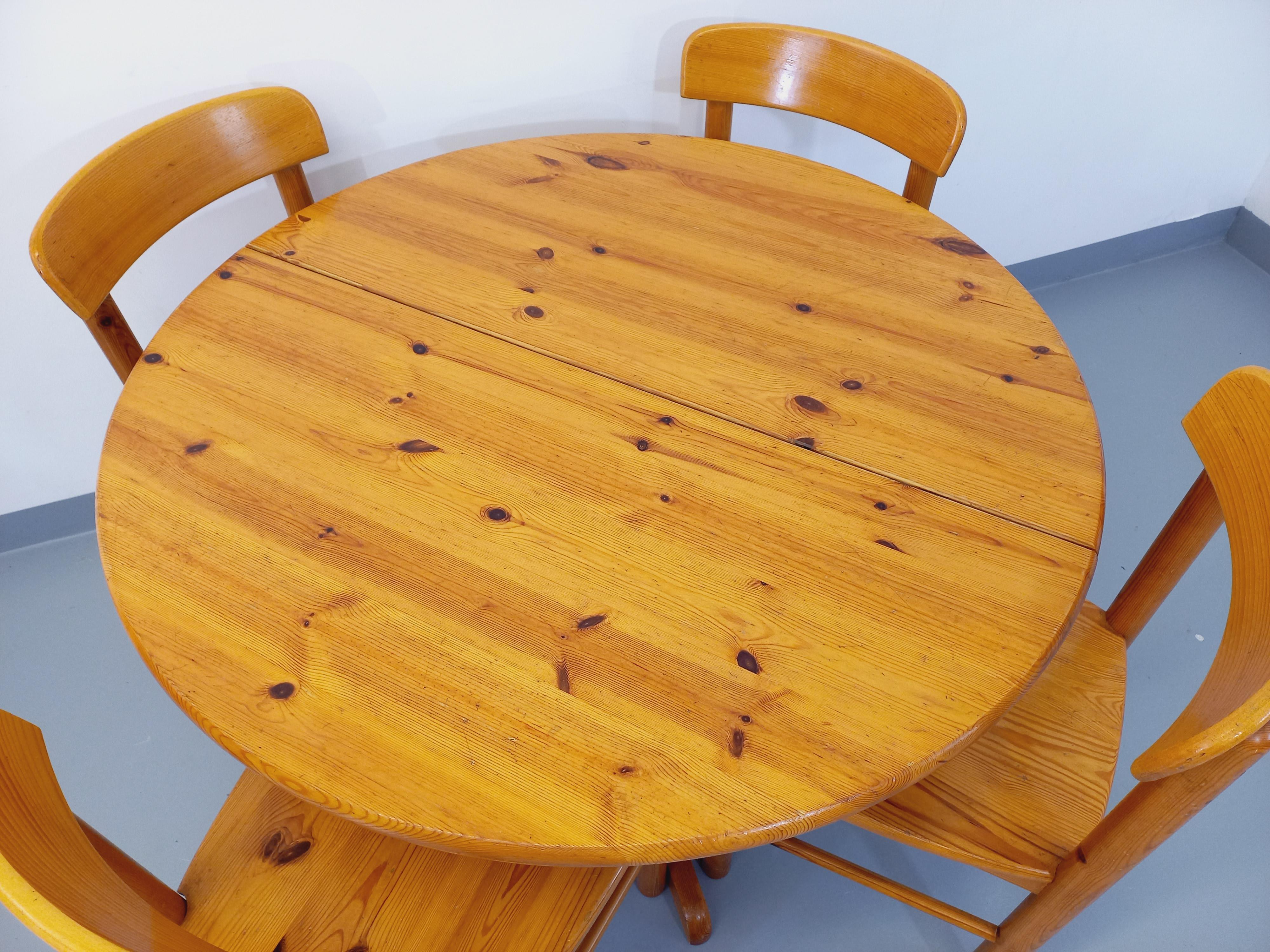 Suite d’une table ronde avec rallonge et 4 chaises vintage en pin des années 60 For Sale 1