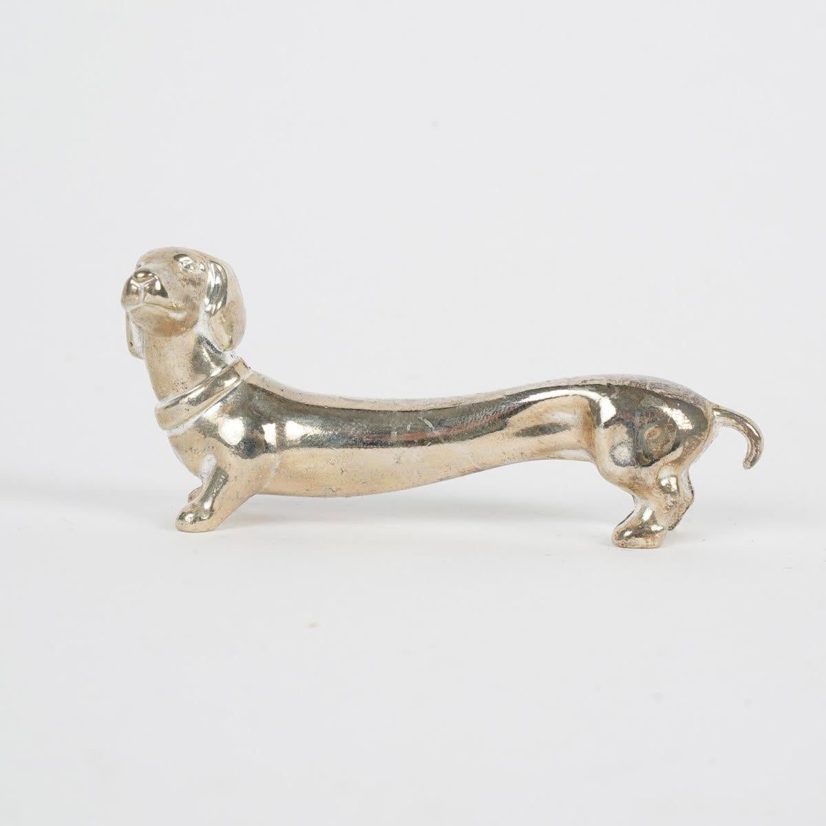 Modern Suite of 12 Silver-Plated Dog-Shaped Knife Rests, 1980. For Sale