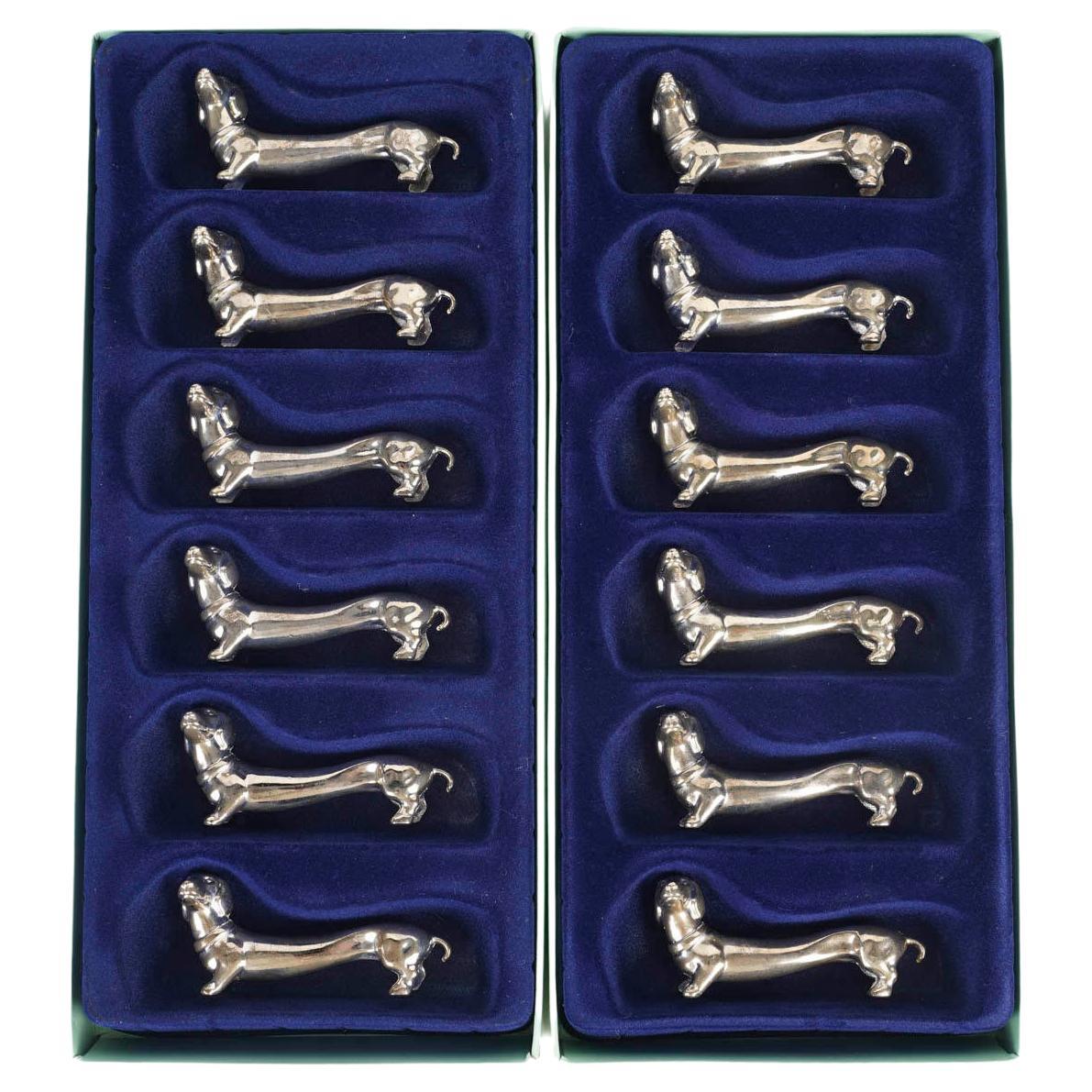 Suite of 12 Silver-Plated Dog-Shaped Knife Rests, 1980. For Sale