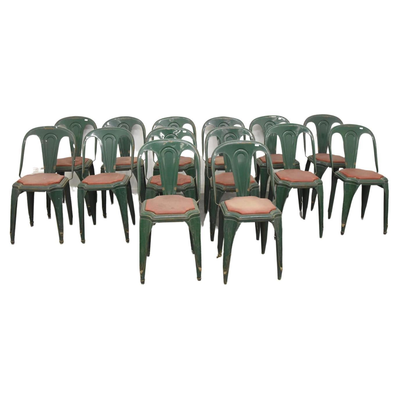Suite de 14 chaises industrielles de la marque Fibrocit, datant d'environ 1950