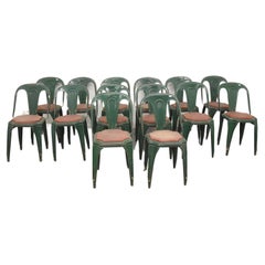 Suite de 14 chaises industrielles de la marque Fibrocit, datant d'environ 1950