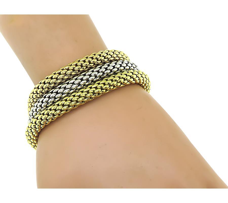 Dies ist eine charmante Suite von 3 18k Gelb-, Rosé- und Weißgold-Armband-Set von Fope. Das Set misst 7 mm in der Breite und 7 3/4 Zoll in der Länge. Der Satz ist mit FOPE 750 signiert und wiegt 83,9 Gramm.
