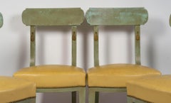 Suite of 4 Chairs in Painted and Gilded Wood, Leather Seat, Regency Style.