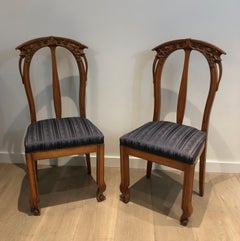 Suite of 4 Cherry Wood Chairs Decorated with Flowers and Plants.