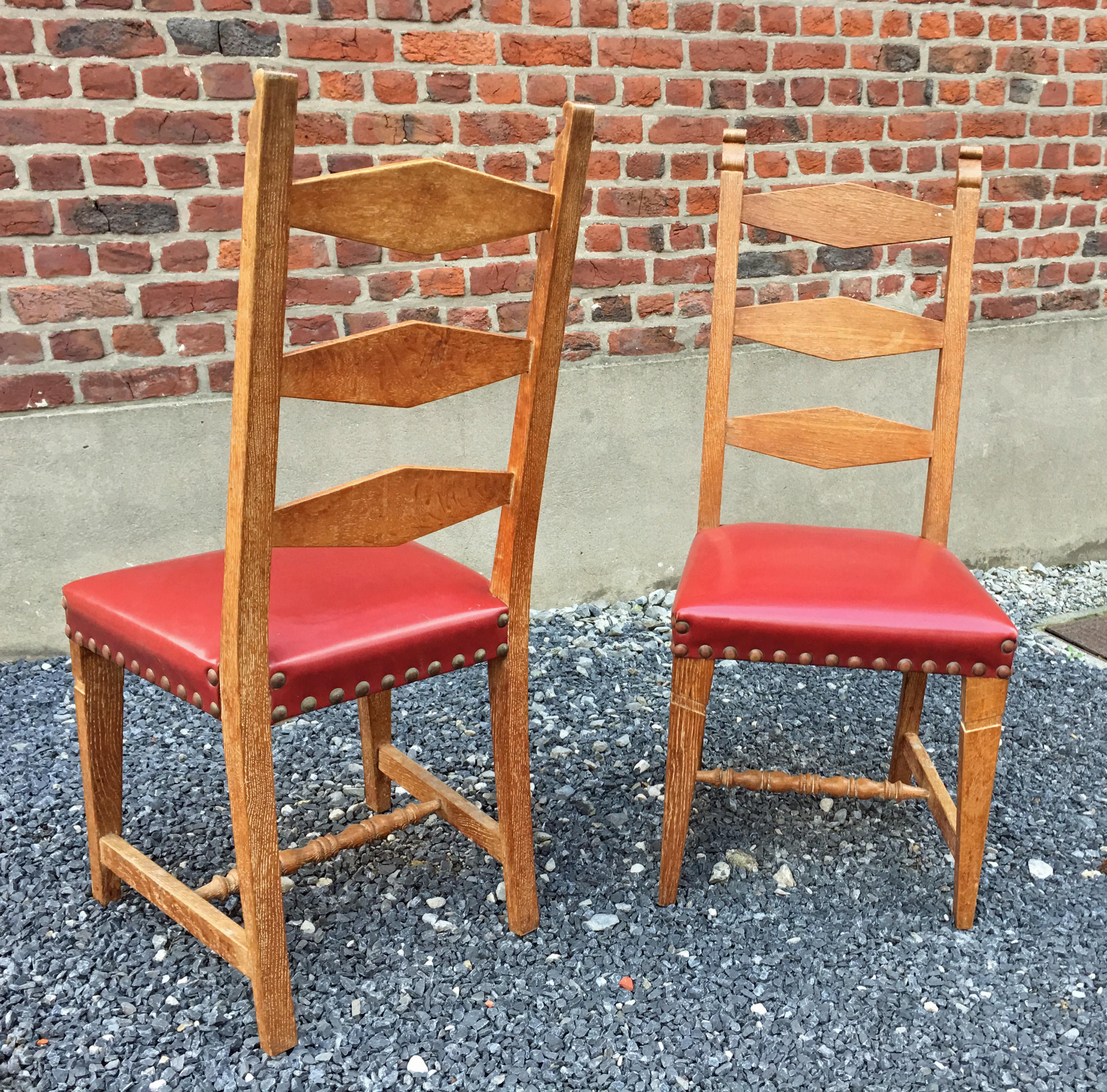 suite of 4 oak chairs, faux leather covering, circa 1950.