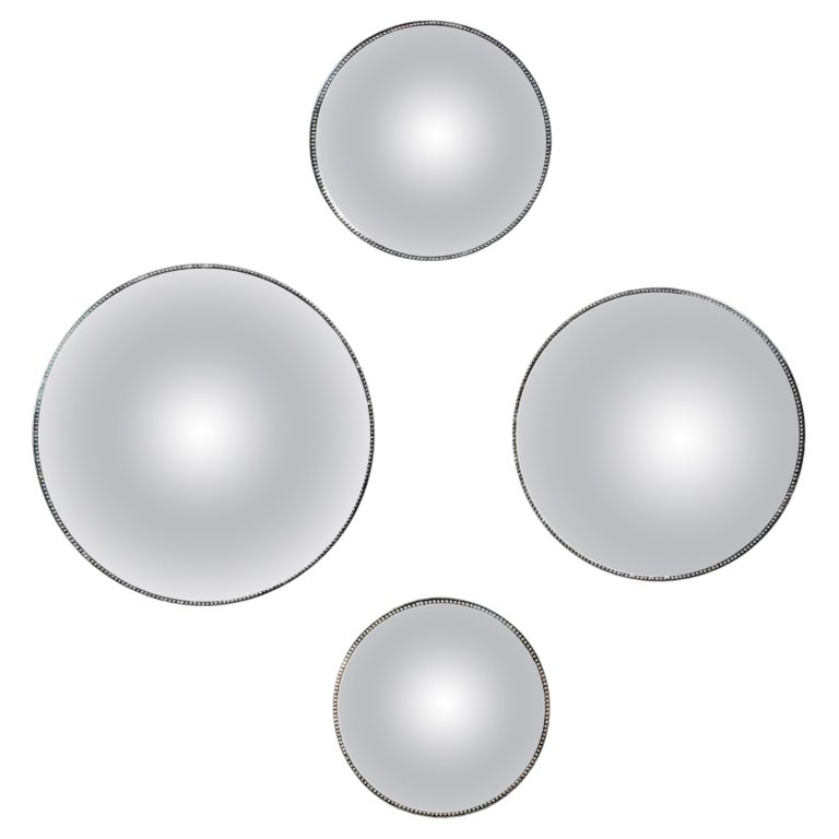 Suite de 4 miroirs Witches de 4 tailles différentes, 20e siècle.