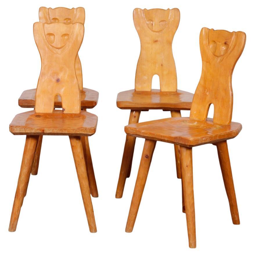 Suite of 4 wooden chairs with zoomorphic backs, 1960s For Sale
