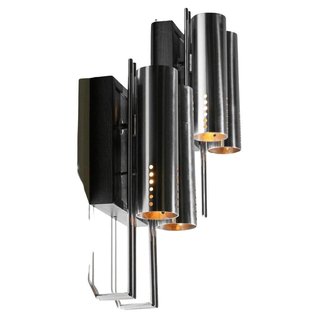 Set of 3 pairs of Italian sconces from the 70s. Structure and lampshade in chrome-plated metal and perforated on the top of the diffusers. Base in solid blackened oak. Very nice pair of modernist sconces with a clean and elegant design. Traces of