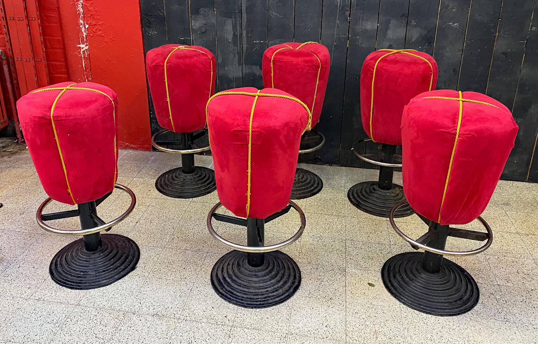 suite of 6 fun stools, cast iron base, seat covered in velvet;
the fabric is worn.